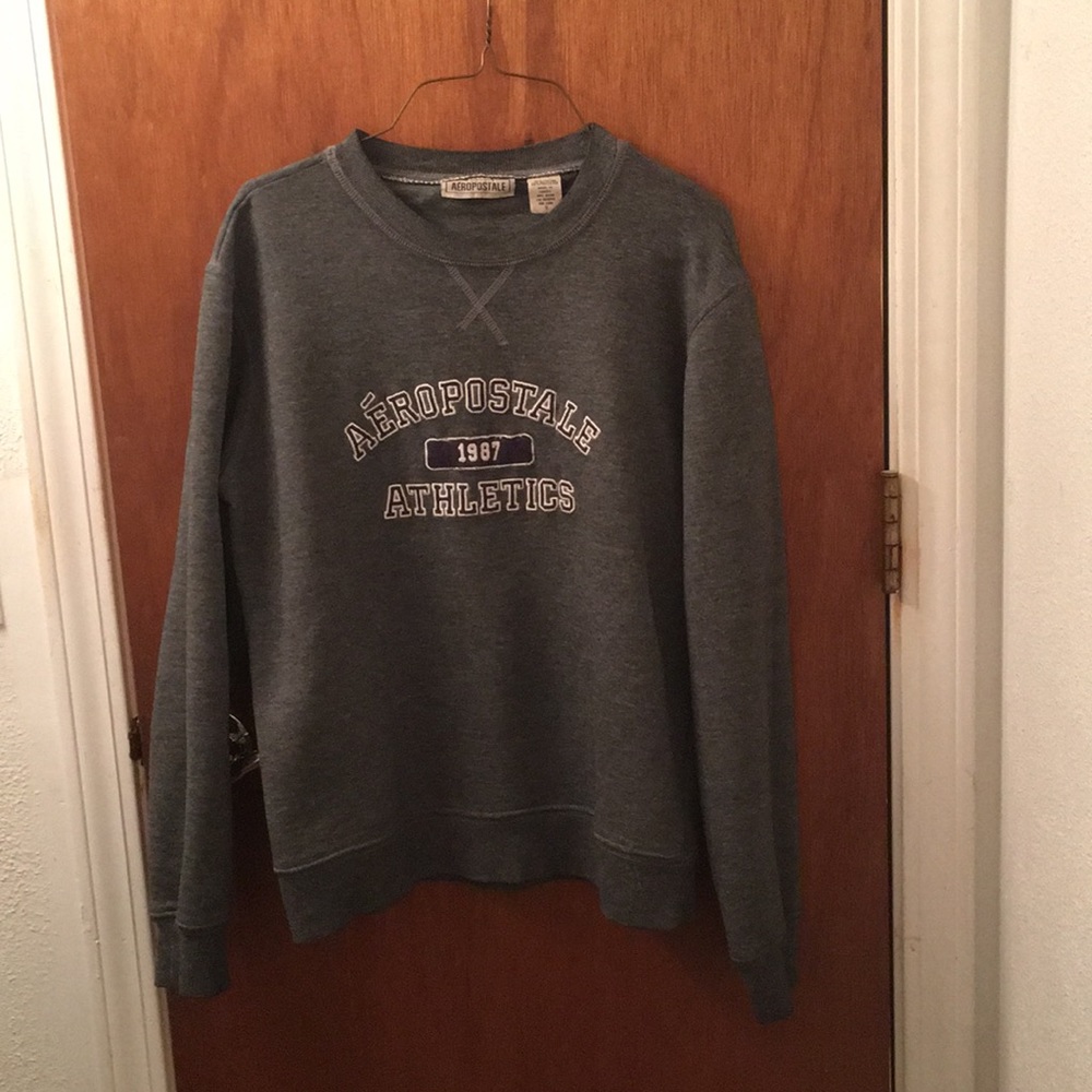 Dark gray sweatshirt.